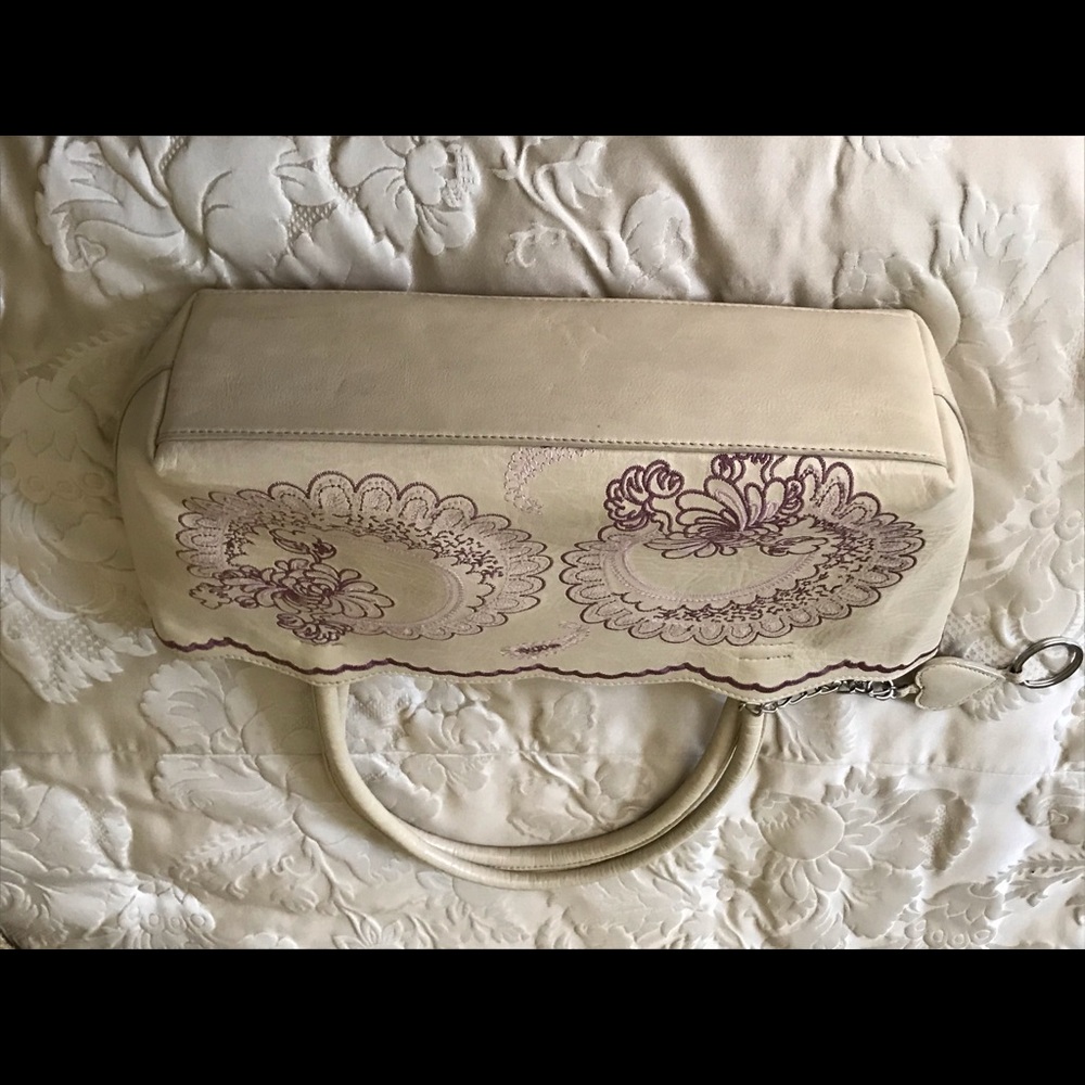 Handbag with pink suede insert